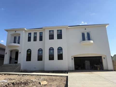 Newly built two-story white home in the Houston area